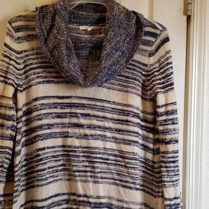 Turtleneck sweater.  Split in back